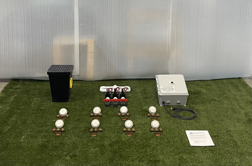 Components included with an 8-nozzle freshwater dog water park kit, including spray nozzles, manifold, control box, drain box, and instructions