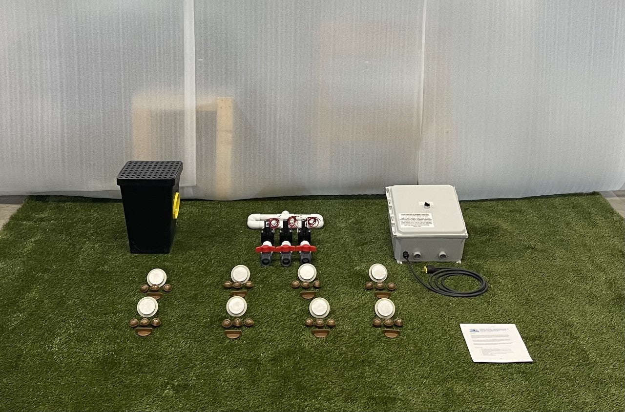 Components included with an 8-nozzle freshwater dog water park kit, including spray nozzles, manifold, control box, drain box, and instructions