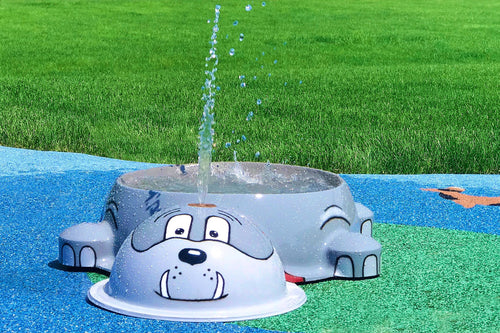 Gray bulldog water bowl feature spraying water at a dog water park