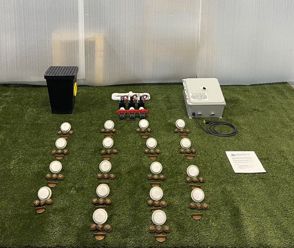 Components included with a 12-nozzle freshwater dog water park kit, including spray nozzles, manifold, control box, and drain box
